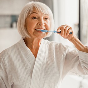 a person brushing their teeth