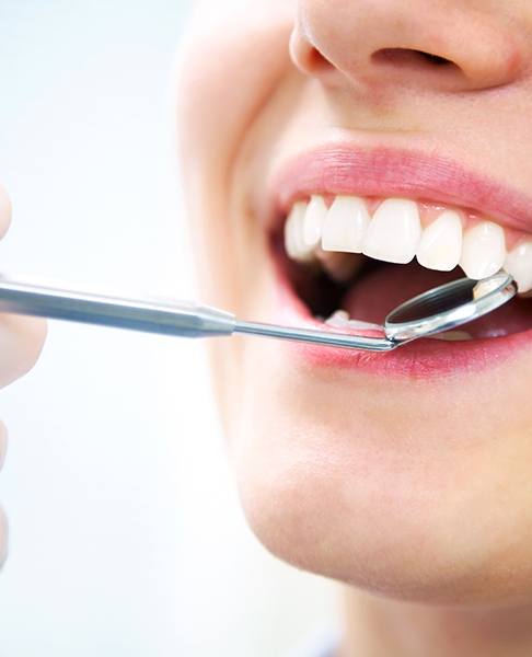 a close-up of a patient’s healthy smile