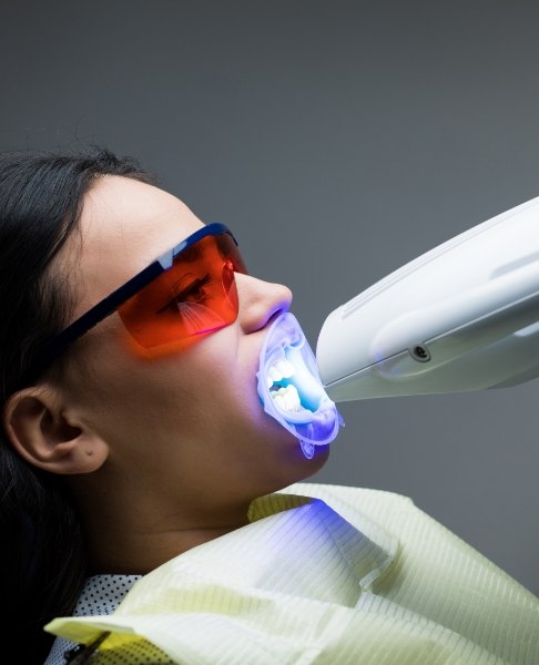 Patient receiving teeth whitening treatment