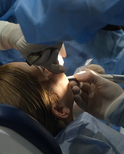 Woman getting oral surgery