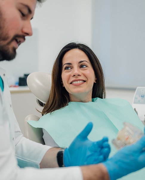 Woman smiling at the dentist