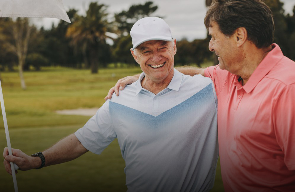 Two older men with healthy smiles after visiting their dentist in Glendale