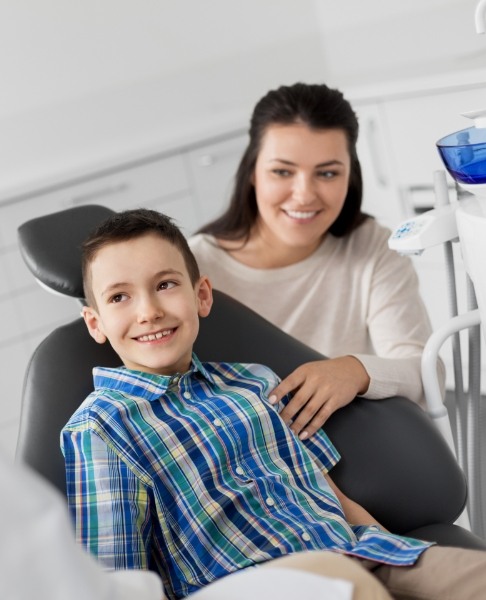 Mother and young child in dental office for children's dentistry