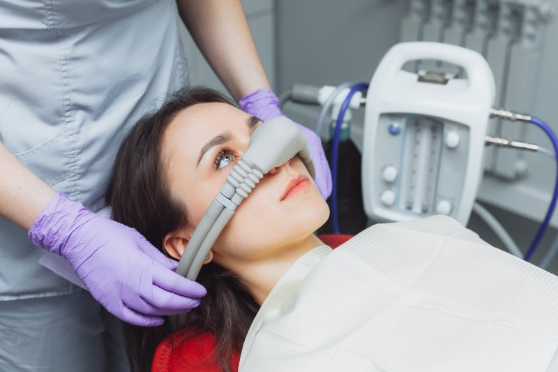 A woman receiving sedation dentistry